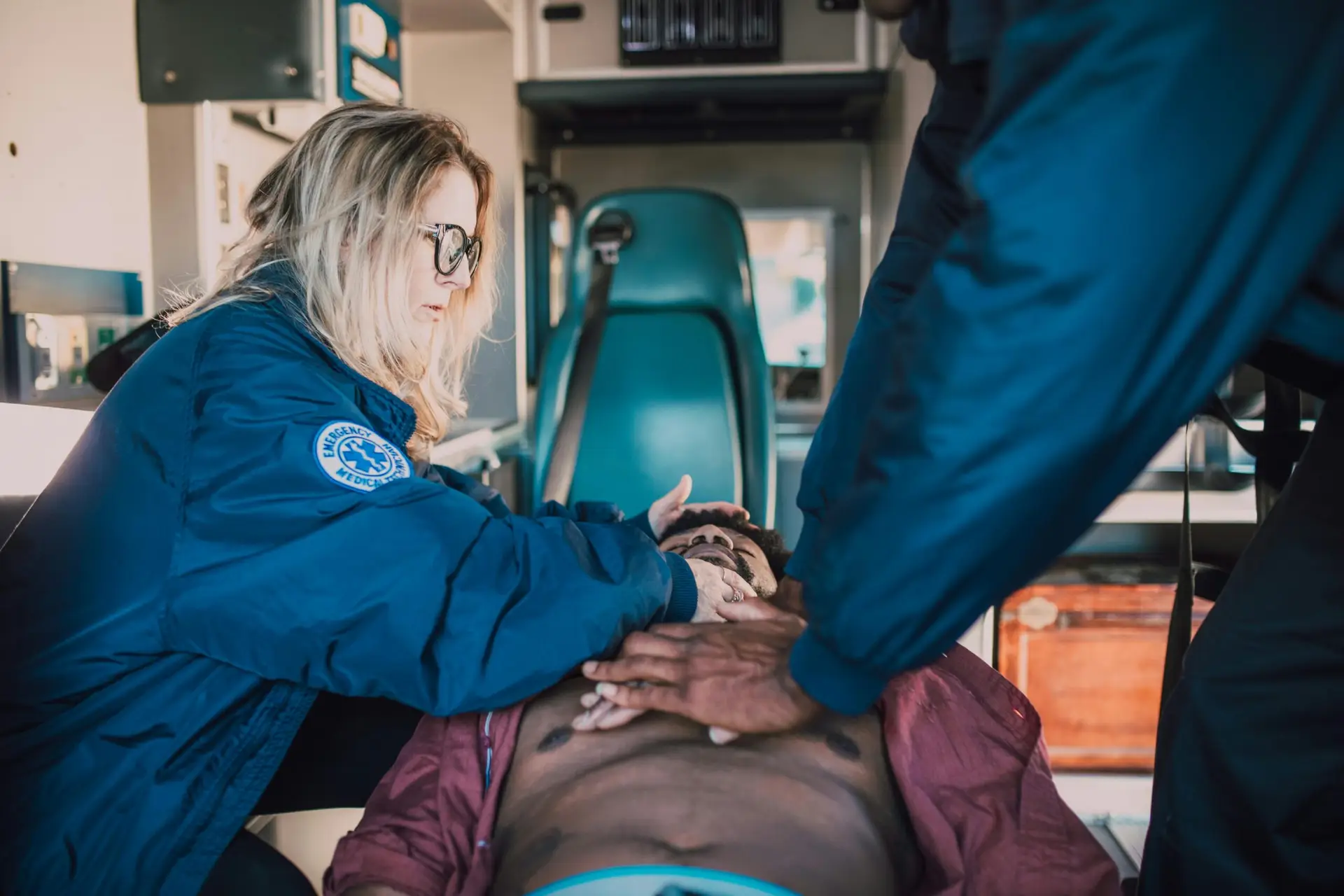 Paramedics working on person